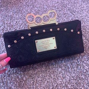 Brass knuckles purse